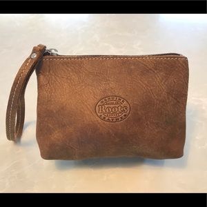 Roots genuine leather wristlet. Excellent condition, never used.